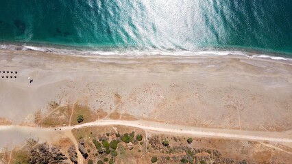 aerial view of a beautiful sandy beach by the blue Mediterranean Sea near Manilva with the Senda...