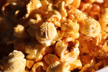 popcorn It's a snack. Made from corn kernels Now known to many peoples. Popcorn originated in the...