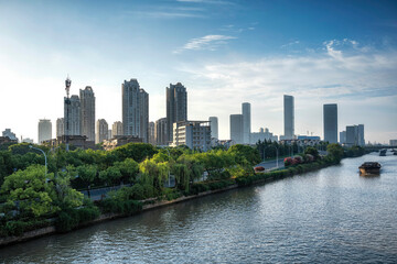 A grand canal runs through the modern city