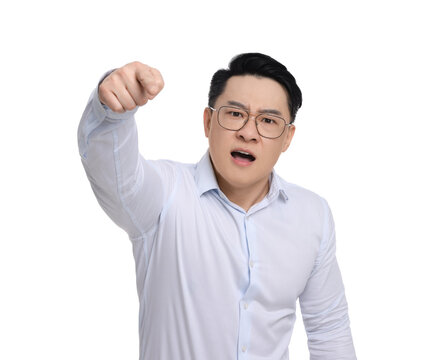 Angry businessman in formal clothes screaming on white background