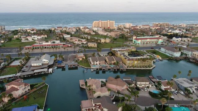 Aerial views from over South Padre Island and Laguna Madre at sunset. 