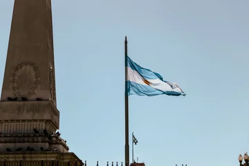 Tuinposter Buenos Aires, Argentina - December 21, 2022: The Argentina flag flying in Buenos Aires Argentina. © Torval Mork