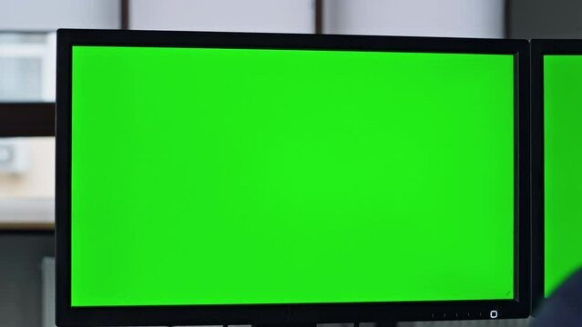 Closeup chromakey screen in office. It manager working on template computer