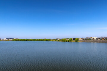 Scenery of the reservoir at Koshigaya LakeTown in Koshigaya, Saitama, Japan. May 5, 2023