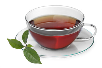 Glass cup of hot aromatic tea and green leaves on white background