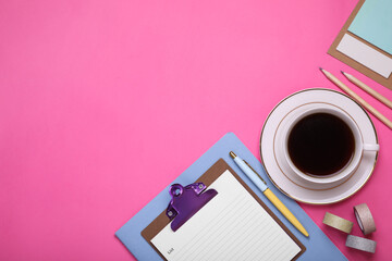 To do notes, stationery, planner and cup of coffee on pink background, flat lay. Space for text
