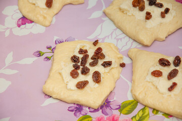 raisins on dough with cow's cheese,  branzoici  din Bistrita,Romania