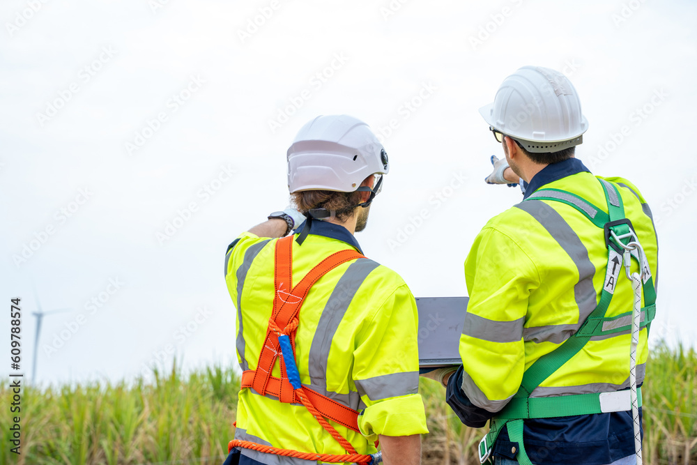 Poster maintenance engineer man working in wind turbine farm,wind turbine operations that transform wind en