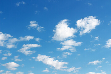 Blank sky surface with small clouds