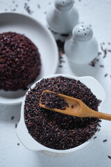 black rice and rice. also known as purple rice. Oryza sativa L. indica. staple food. carbohydrate. beras hitam.