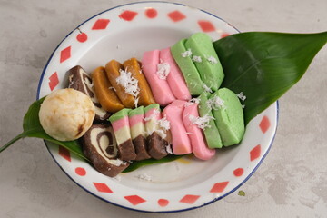 Gethuk Getuk Lindri is a snack made with the main ingredient of cassava which is sweetened with sugar or palm sugar, is a food that is easily found in Central Java. Grated coconut. Indonesian food. 