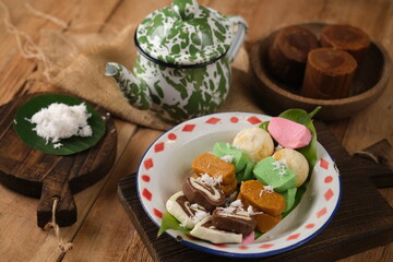 Gethuk Getuk Lindri is a snack made with the main ingredient of cassava which is sweetened with sugar or palm sugar, is a food that is easily found in Central Java. Grated coconut. Indonesian food. 