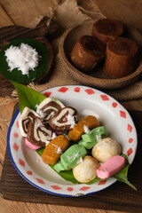 Gethuk Getuk Lindri is a snack made with the main ingredient of cassava which is sweetened with sugar or palm sugar, is a food that is easily found in Central Java. Grated coconut. Indonesian food. 