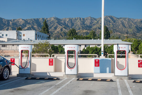 Burbank, California, USA – June 4, 2023. Tesla charging stations at public parking lot