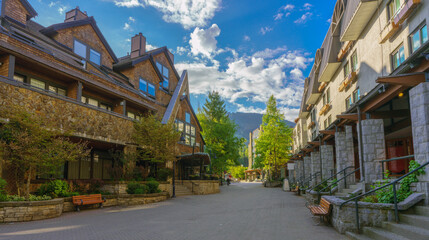 Solitude at picturesque Whistler Village in the calm of early morning, with mountain backdrop.