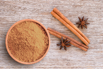 star anise and cinnamon with cinnamon powder