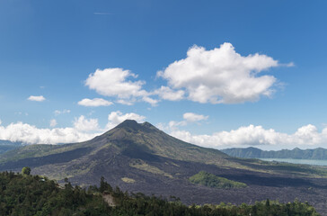 Fototapeta premium Mount Agung volcano against a blue sky