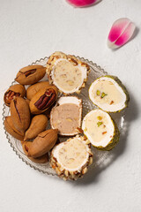 Delicious Turkish delight with pistachios and pecan nuts, top view
