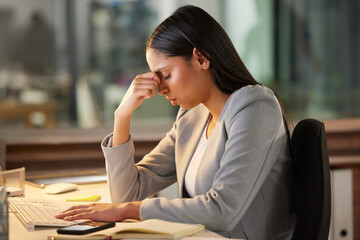Fototapeta premium Headache, stress and sad business woman in night office for burnout, fatigue or mental health problem. Crisis, pain and depressed or tired professional person at desk for mistake, depression or fail