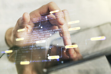 Abstract creative coding concept with finger clicks on a digital tablet on background. Multiexposure