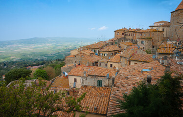 Characteristic terracotta rooftops and outlook over rural Italian landscape