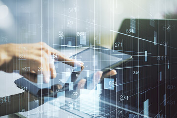 Abstract creative analytics data spreadsheet with finger clicks on a digital tablet on background,...