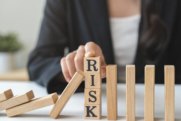 Protection finance, stopping falling block effect collapse domino wooden, Recovery risk business, Management strategy and planning before destroy. Successful intervention.
