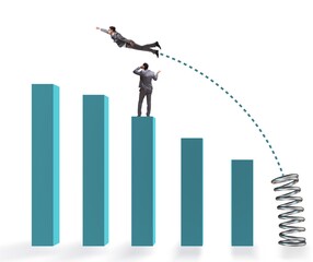 Businessman outperforming his competition jumping over