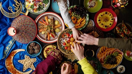 Eid holiday table. Ramadan family dinner. Breaking Fast, iftar. Arabic Middle Eastern traditional cuisine - obrazy, fototapety, plakaty