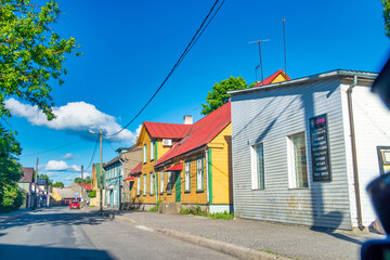 Parnu, Estonia - July 5, 2017: Colourful homes along a countryside road