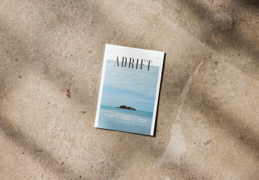 Mockup of closed vertical A4 magazine with customizable front cover