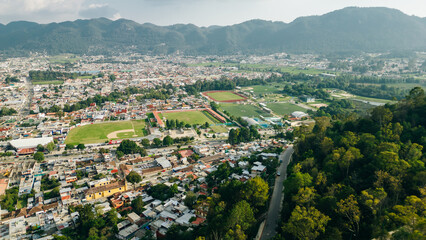 Beautiful aerial view of the rooftops of the old colonial buildings in the city of san cristobal de las Casas on the sunset