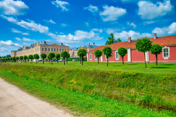 Fototapeta na wymiar Rundale palace and gardens in Latvia. The palace is located near the city Bauska. It is made in baroque style. Famous attraction place for tourists