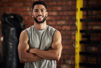 Gordijnen Gym, smile and portrait of man with arms crossed, fitness and happiness in mockup space. Exercise, workout and happy face of bodybuilder, personal trainer or sports club owner for health, training. © Clement Coetzee/peopleimages.com