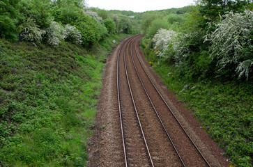 Rural train track curving into distance, UK