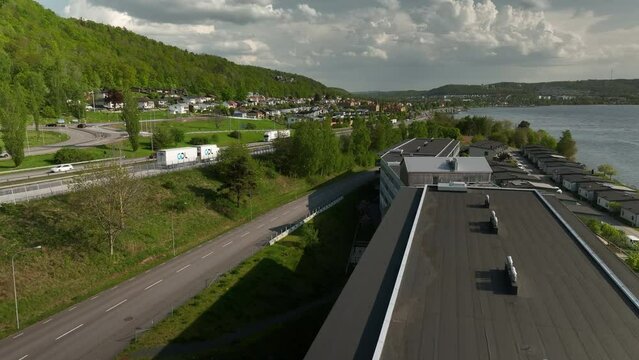 Apartment building next to european highway E4 in Huskvarna, Sweden, drone