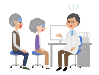 診察室で男性医師に説明を受けてショックを受けるシニア夫婦