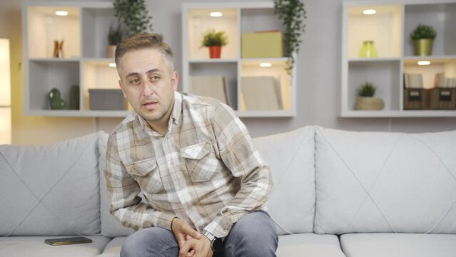 Suspicious man thinks.
