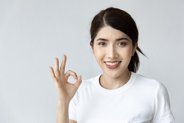 Woman giving approving ok, all correct gesture