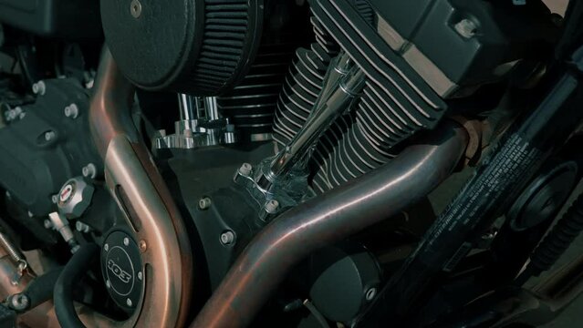 Close-up black suspension system of an off-road motorcycle motorsport or active lifestyle concept side view