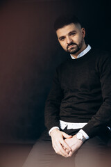 Young man in classy outfit isolated in studio