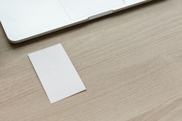 Pass business cards during meetings. Blank business card, mockup, vertical business card