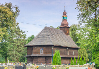 Wooden catholic church of St. Anna in Nierodzim, a district of Ustroń in the Silesian Beskids (Poland). - obrazy, fototapety, plakaty