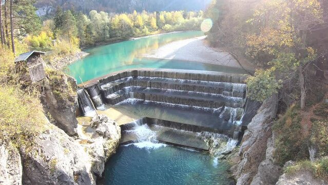 Lechfall waterfall and autumn forest in Fussen, Bavaria, Germany.