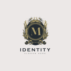 Initial M letter luxury beauty flourishes ornament golden monogram logo art