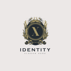 Initial X letter luxury beauty flourishes ornament golden monogram logo art