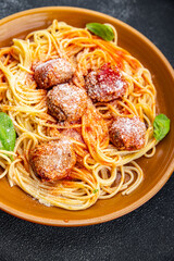 spaghetti meatballs tomato sauce pasta dish meal food snack on the table copy space food background...