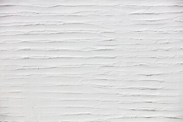 White wavy plastered empty wall background, texture. Greece Cyclades island decoration. Copy space