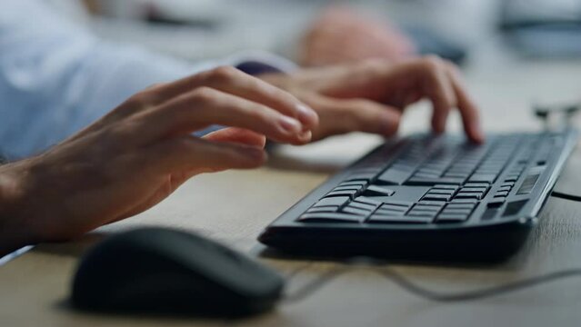 Operator hands typing keyboard closeup. Office manager working clicking mouse