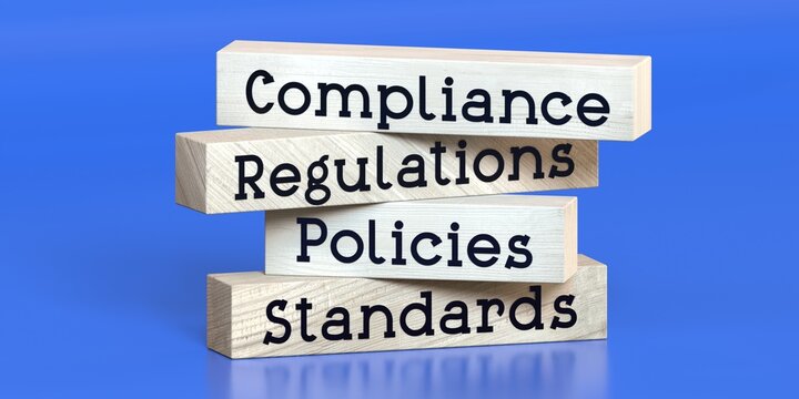 Compliance, regulations, policies, standards - words on wooden blocks - 3D illustration